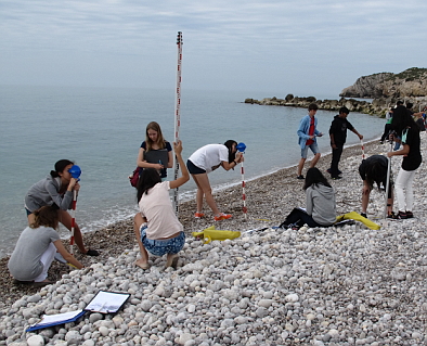 Students measuring beach profiles in Sitges